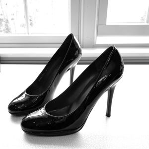 Stuart Weitzman black patent leather pumps